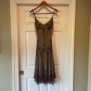 A beautiful olive green and brown dress kneee high